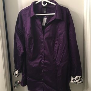 Purple with white polka dotted sleeves and collar